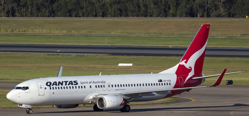 Qantas Airplane on Runway — White