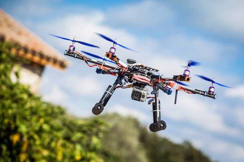 Quadcopter Drone in Flight — Blue