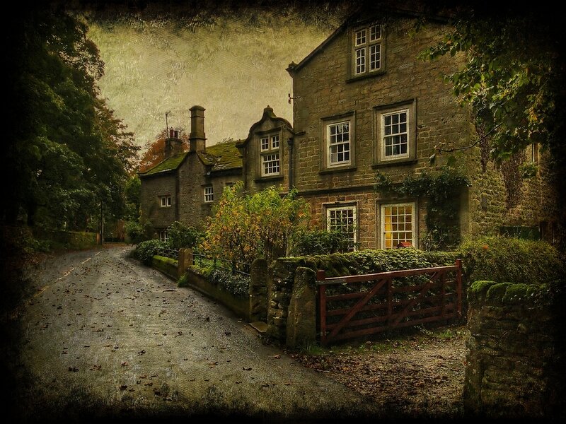 quaint stone cottage on a country lane