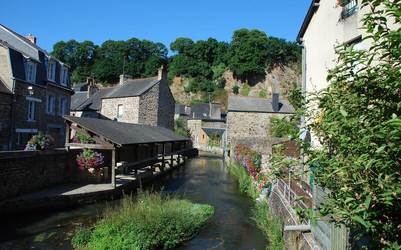 Quaint village with river and stone houses