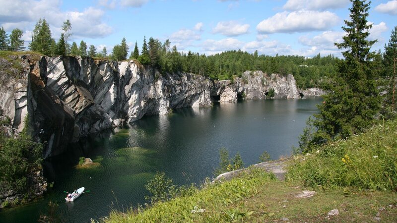 quarry lake with rocky cliffs