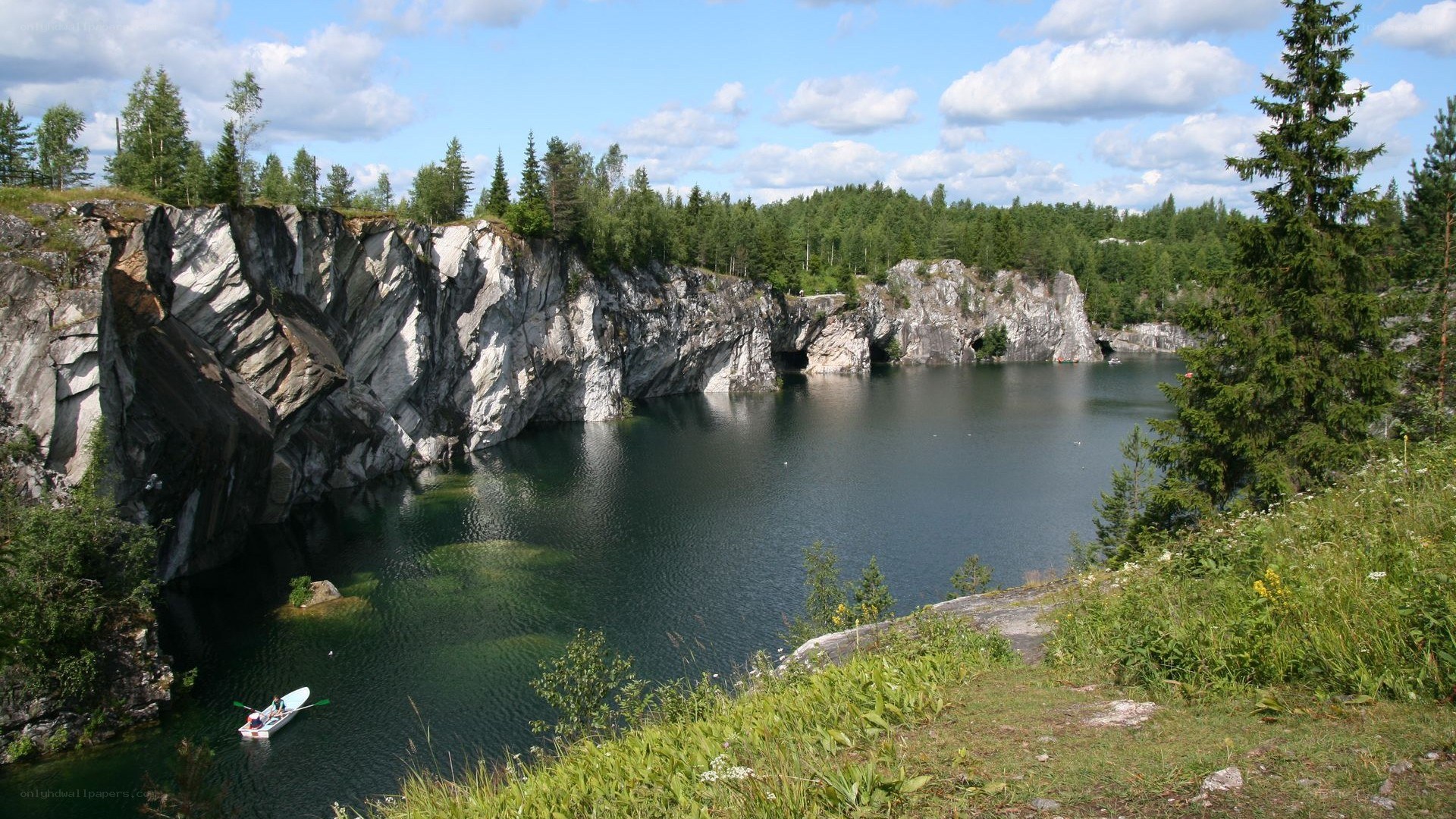 quarry lake with rocky cliffs