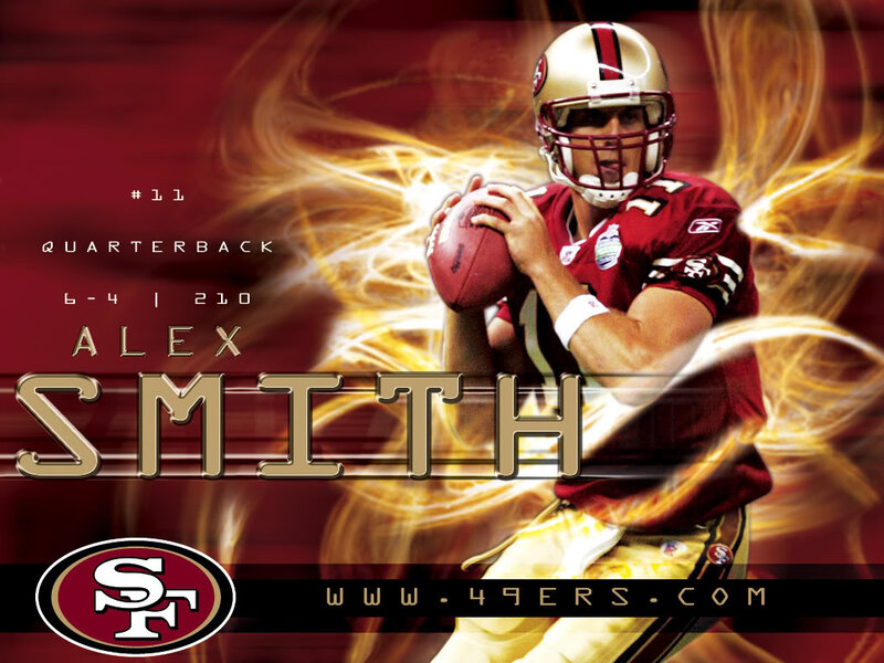 Quarterback Holding Football — Red