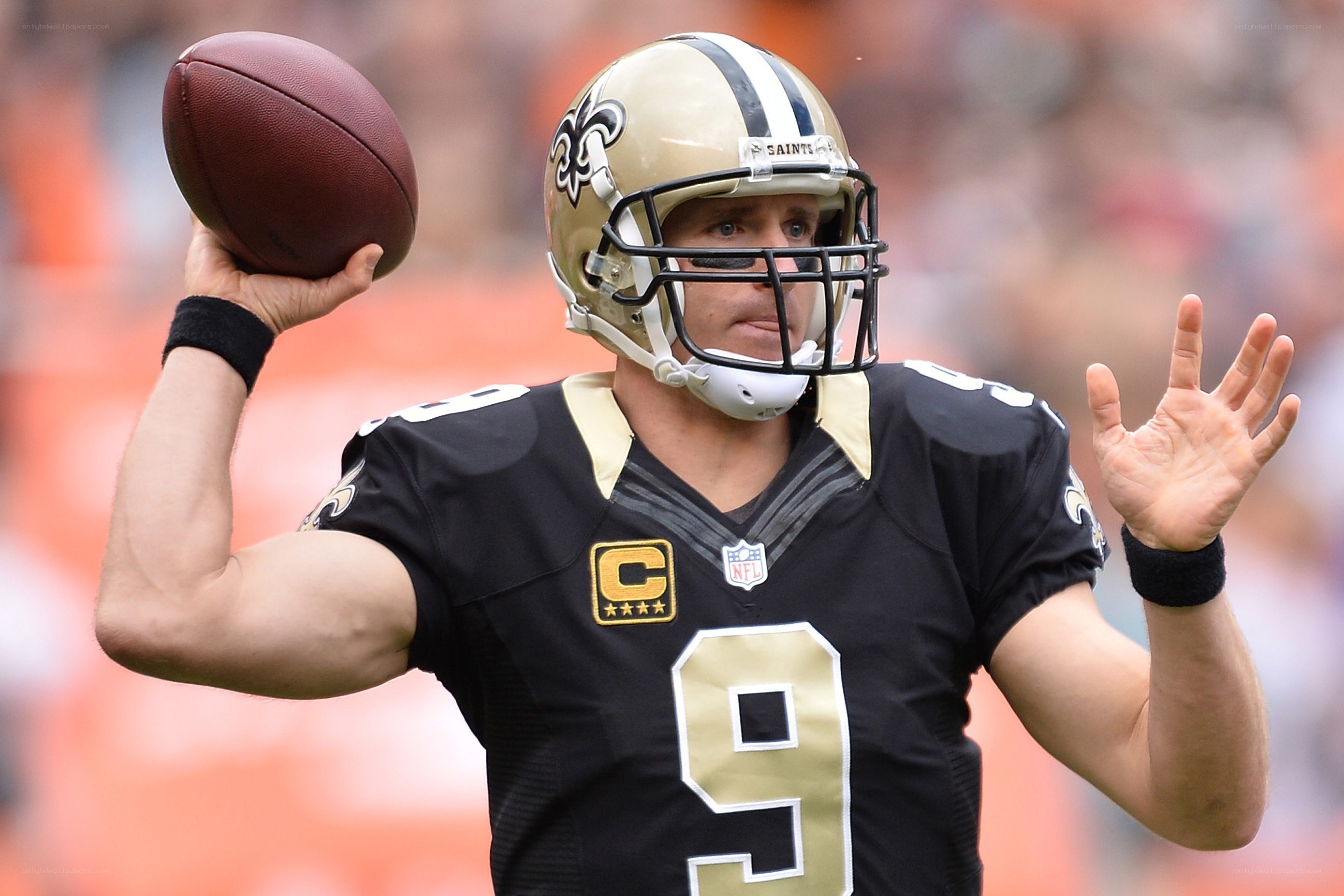 quarterback preparing to throw