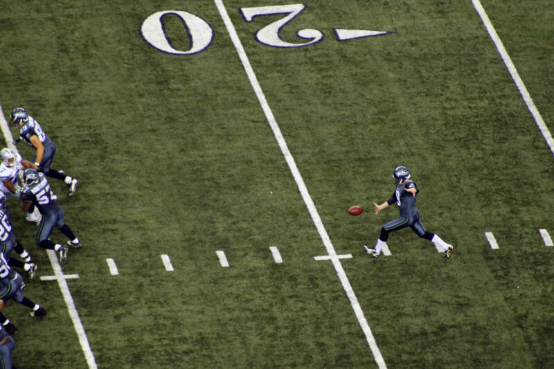 Quarterback throwing a pass