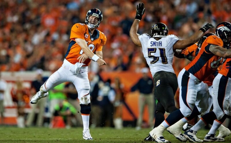 Quarterback Throwing Ball — Orange
