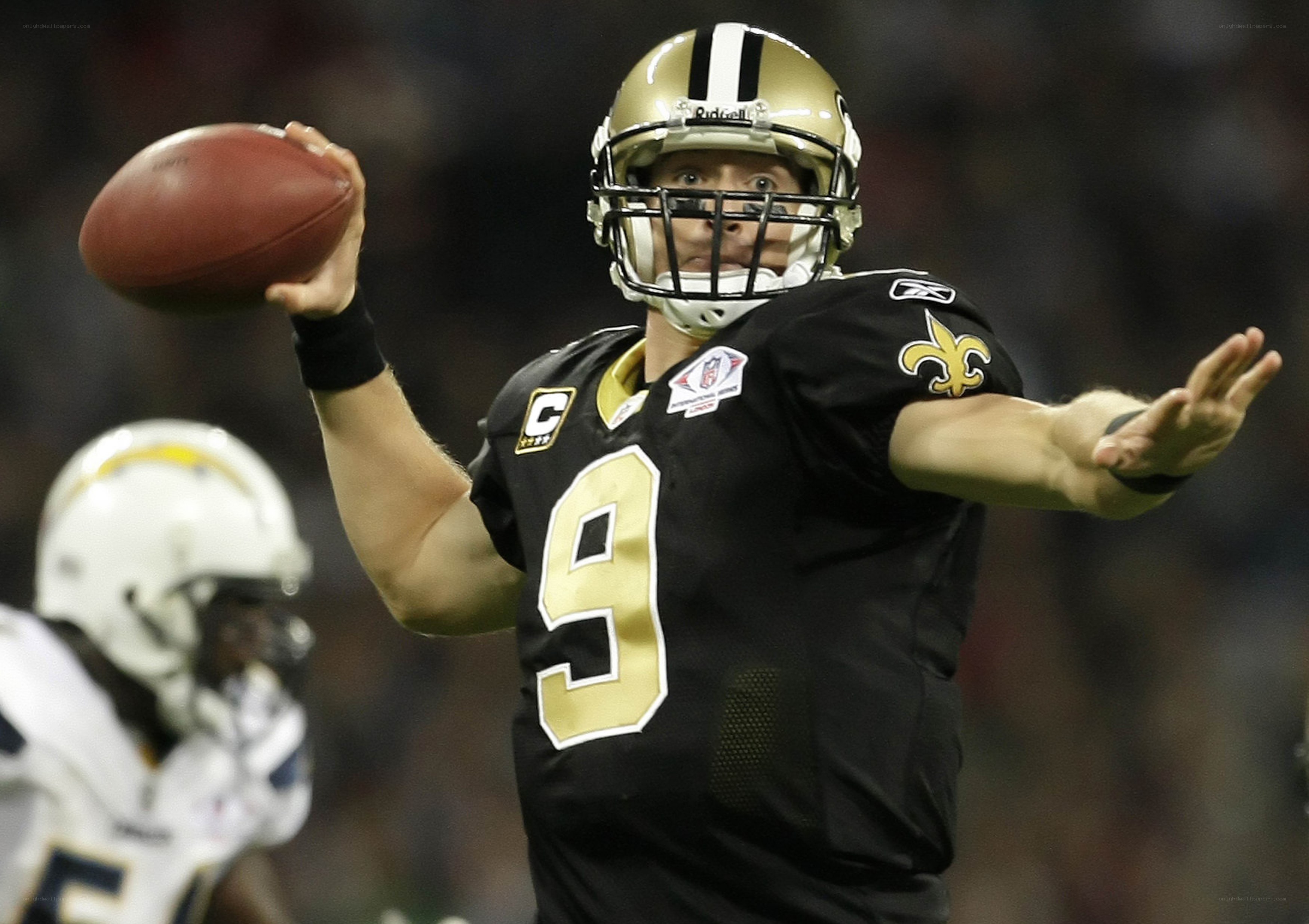 quarterback throwing football