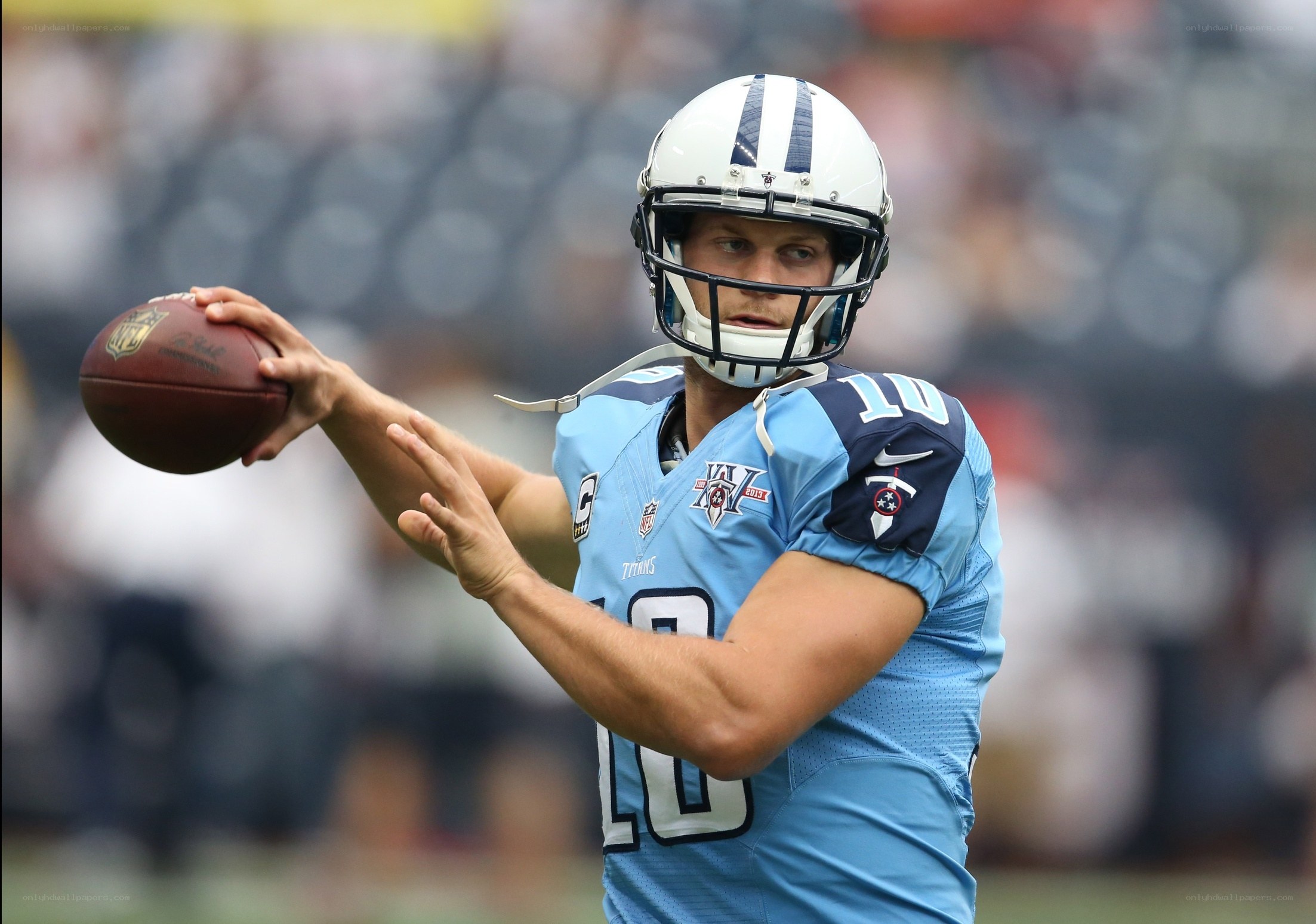 quarterback throwing football