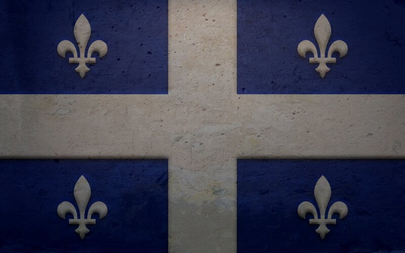 Quebec flag on textured wall