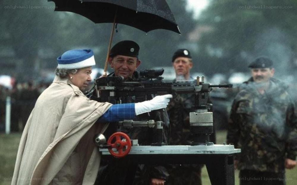 Queen operating a machine gun