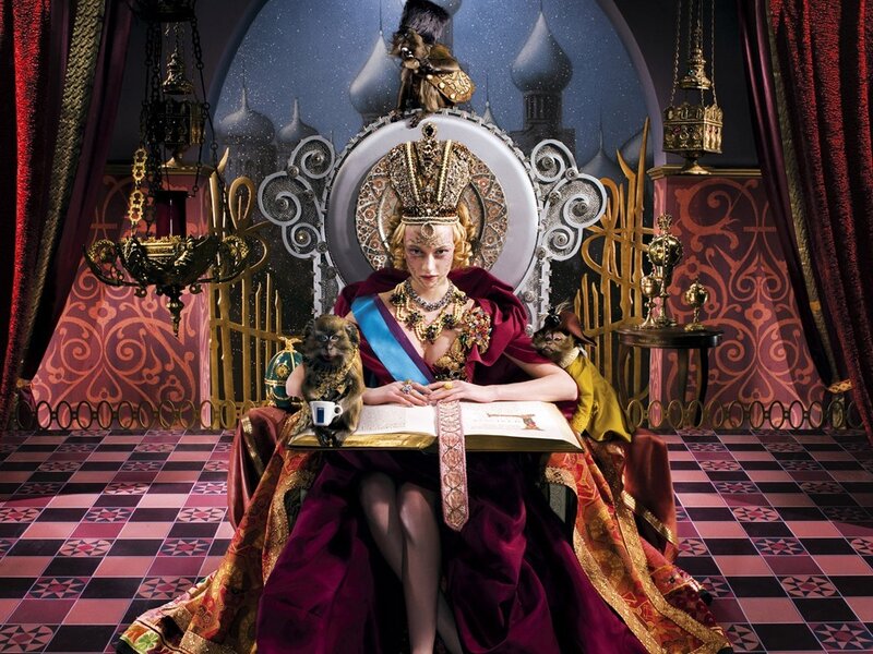 Queen with monkeys on throne