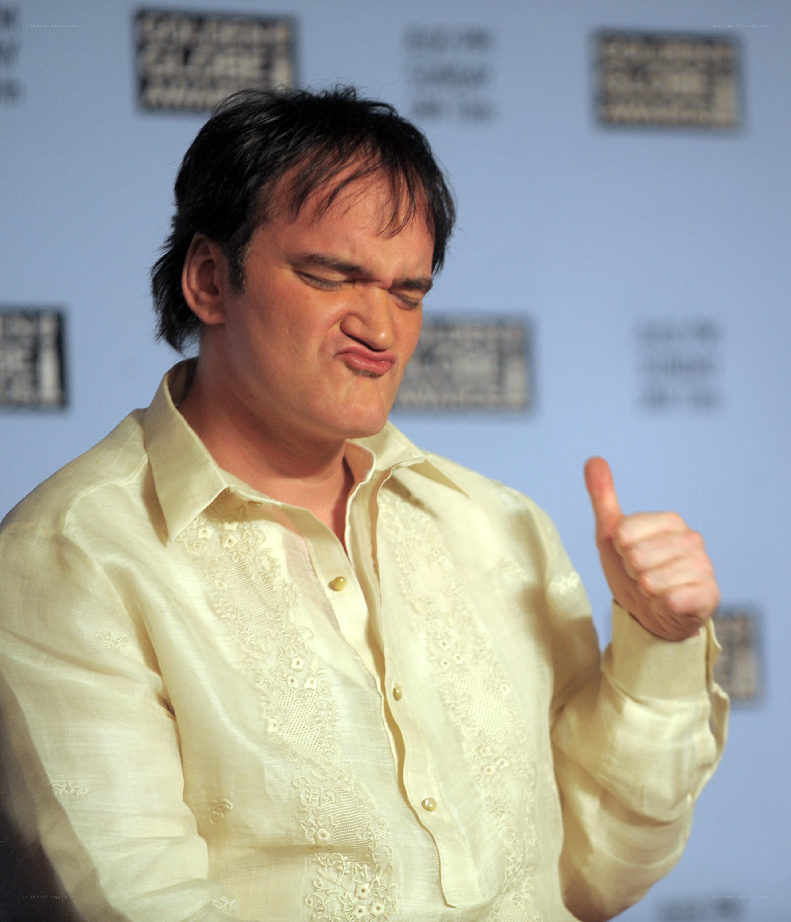 Quentin Tarantino giving a thumbs-up