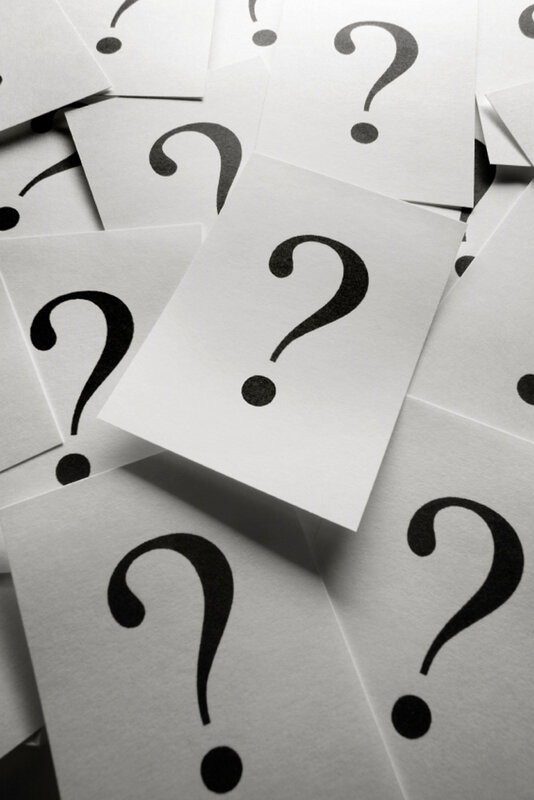 question marks on paper