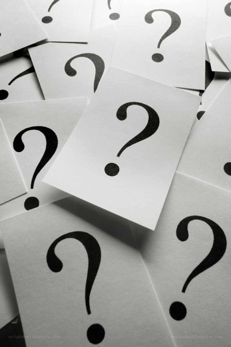 question marks on paper