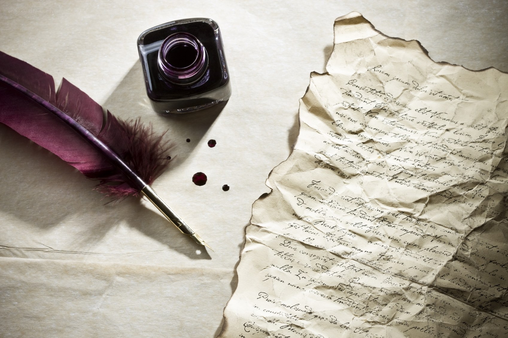 quill pen and ink bottle