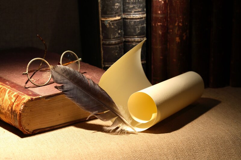 Quill Pen on Book