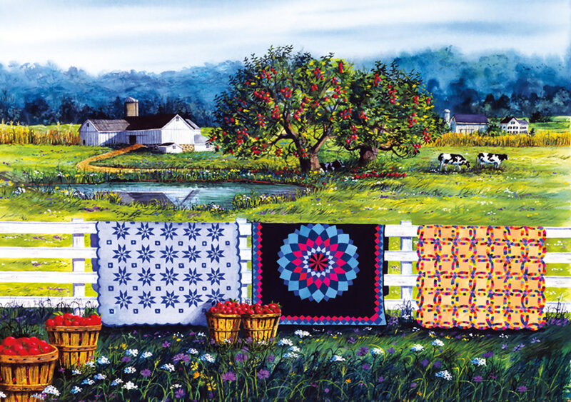 Quilted Blankets on Fence