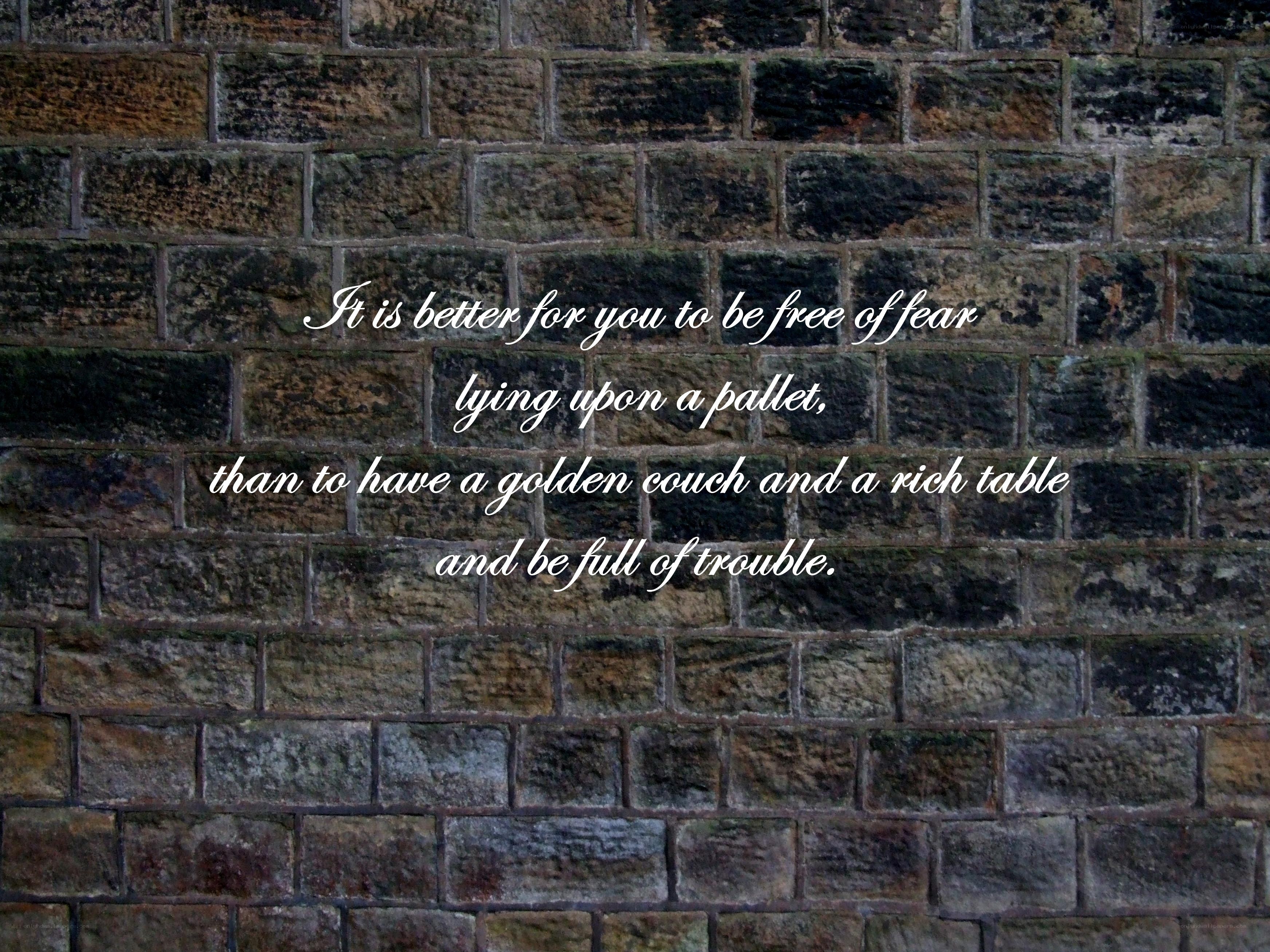 quote on brick wall
