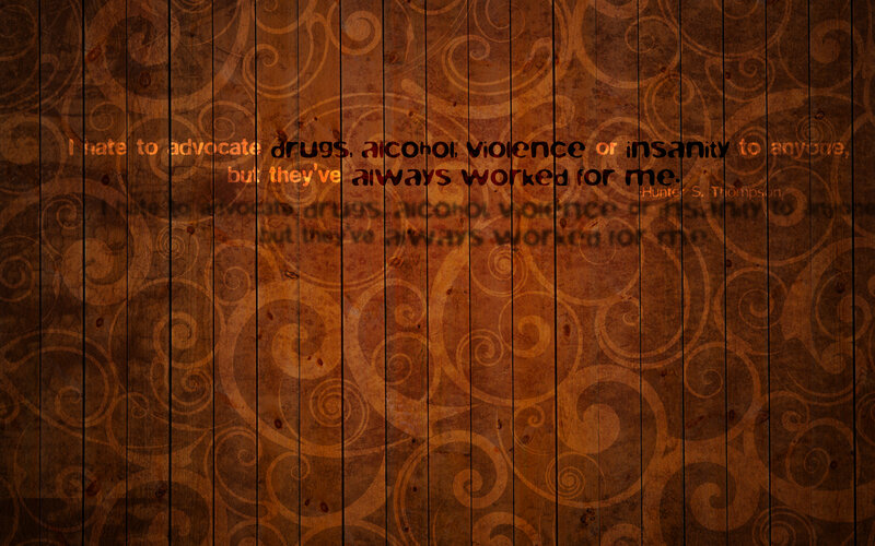 quote on dark wood background