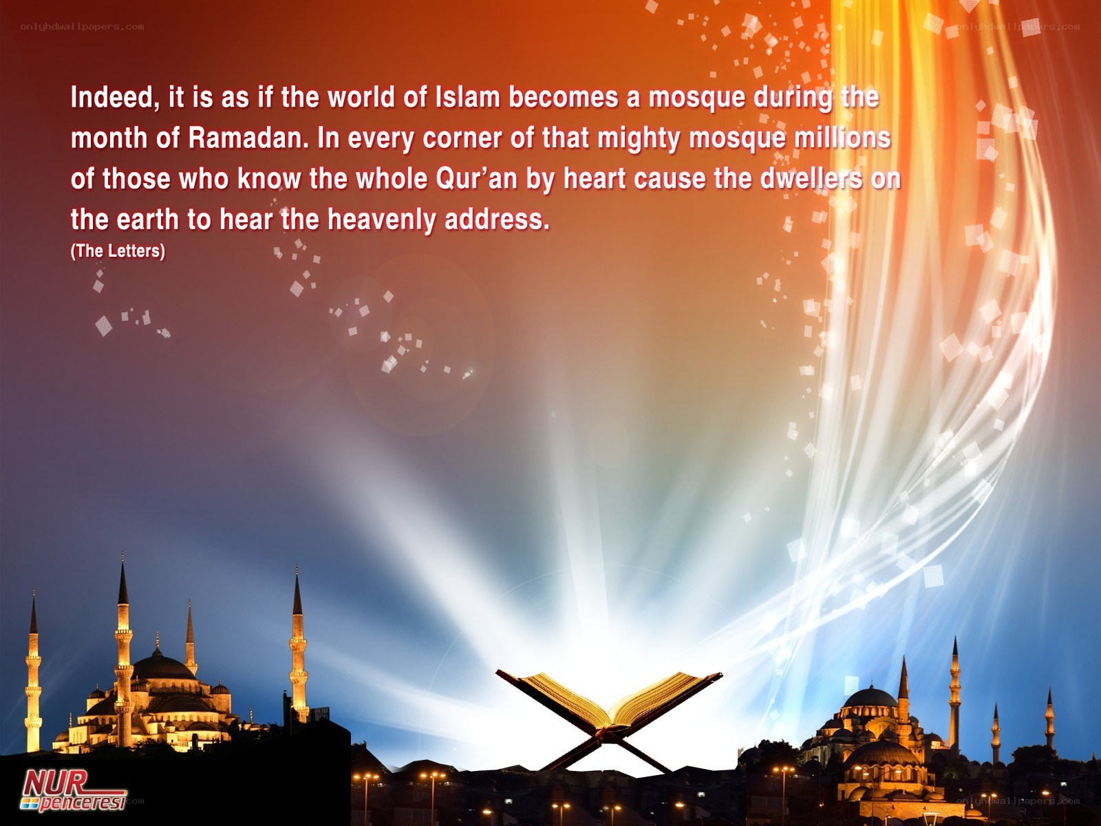 Quran and mosque at night
