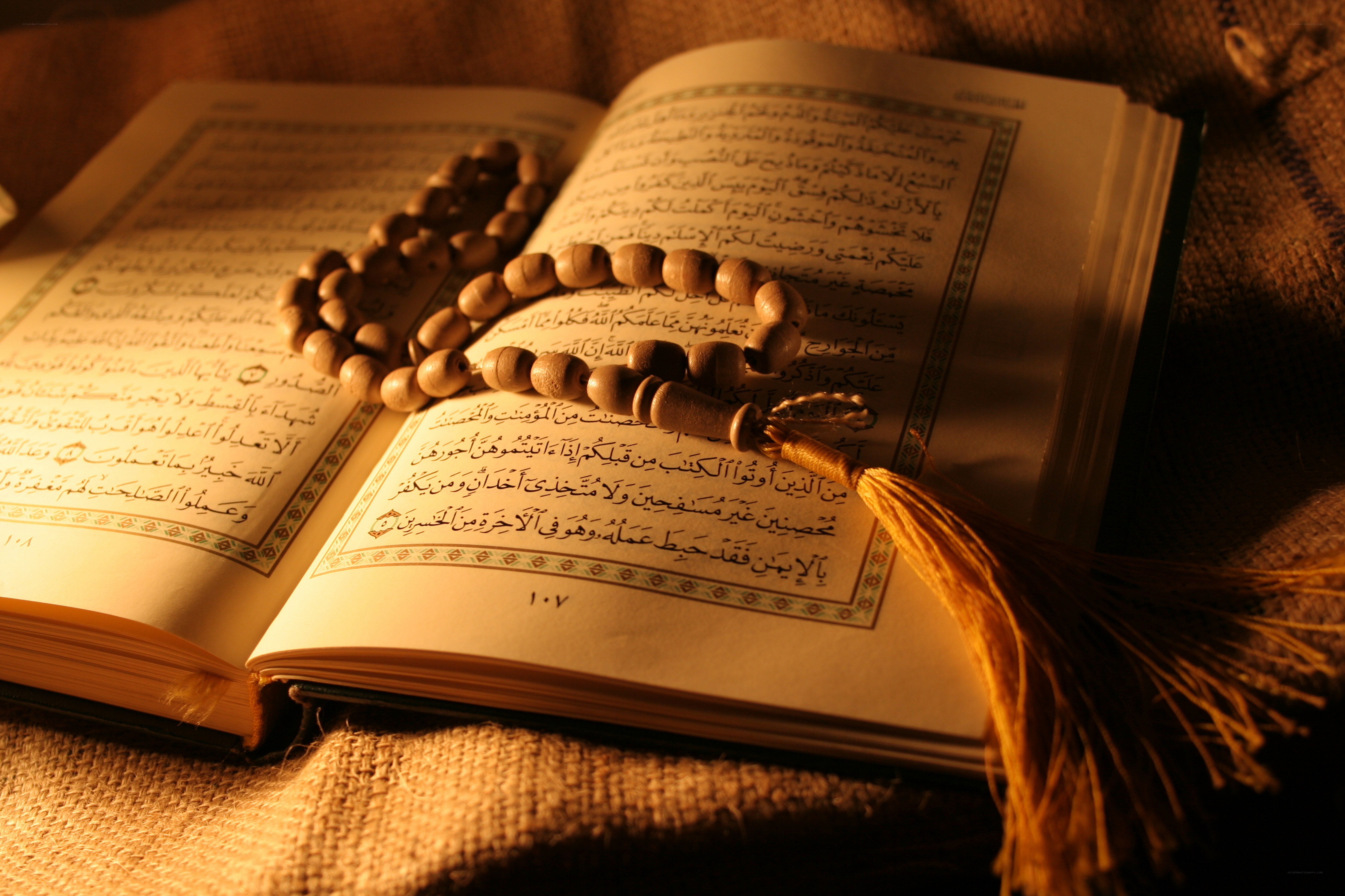 Quran with prayer beads