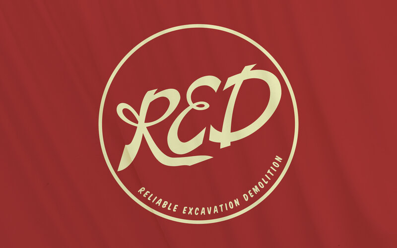 R&D logo on red fabric