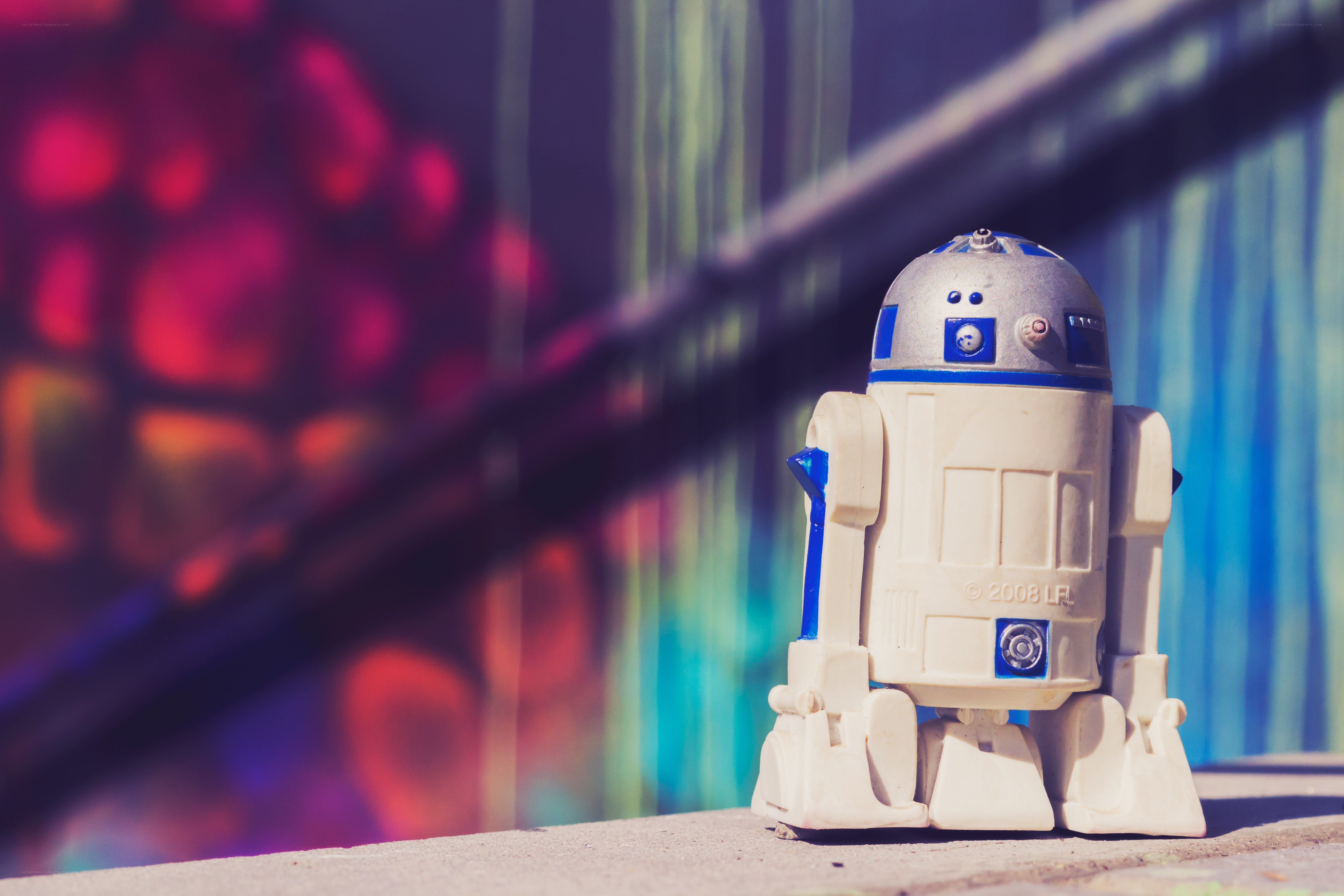 R2-D2 toy on concrete