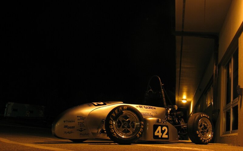 Race car at night in garage