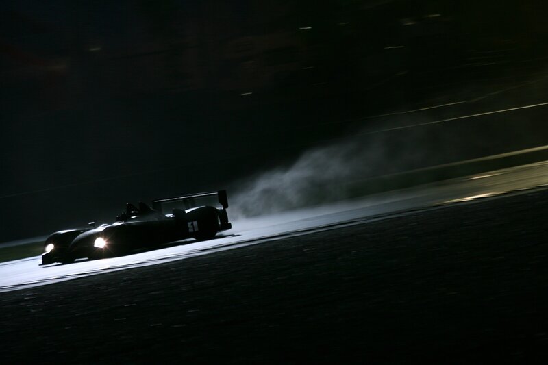Race car at night on track