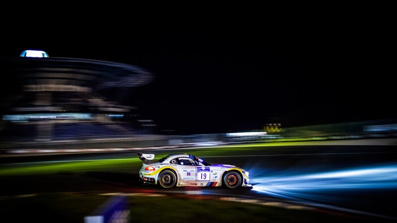 Race car at night on track