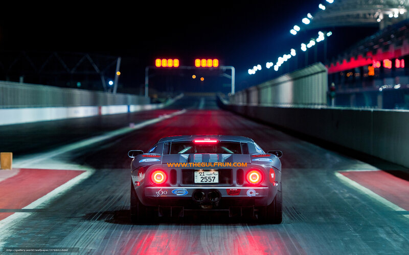 Race car at night on track