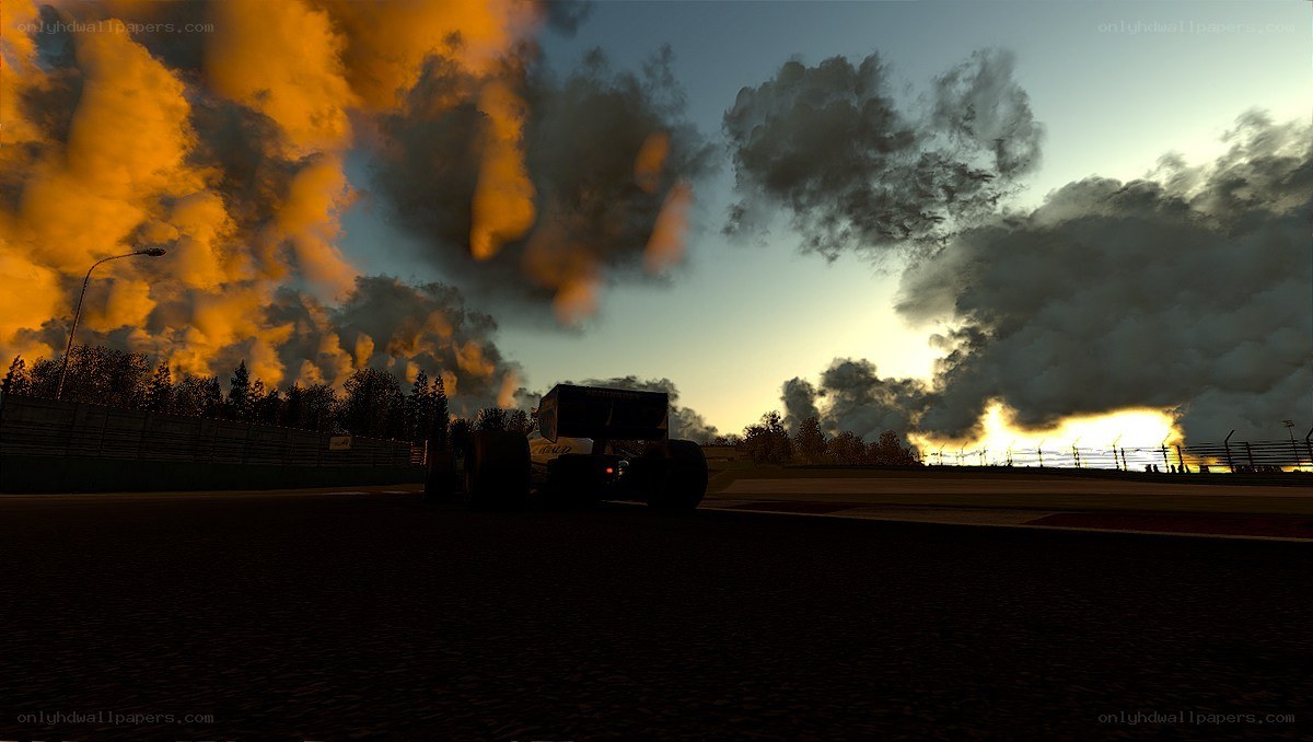 Race car at sunset on track