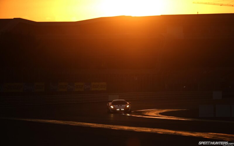 Race car at sunset on track