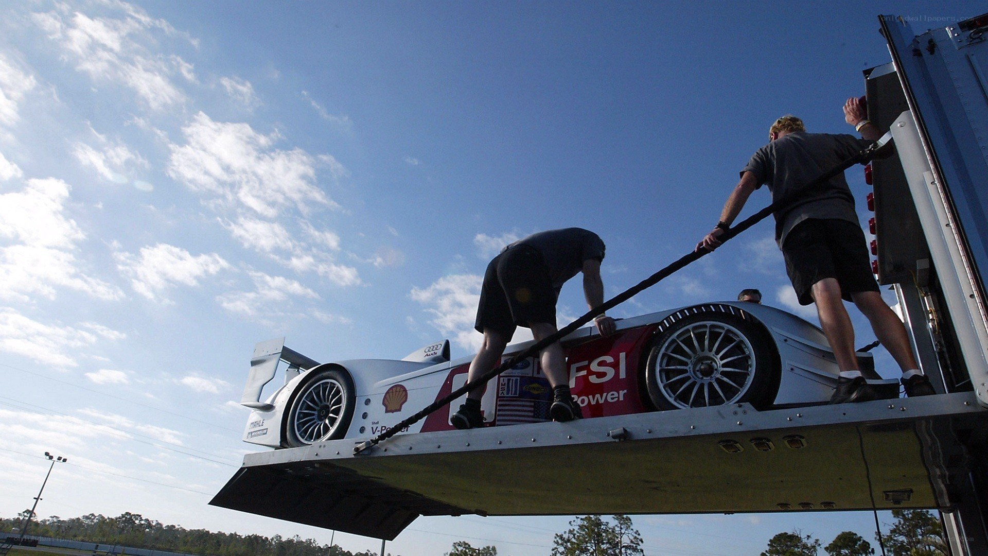 Race car being loaded onto trailer