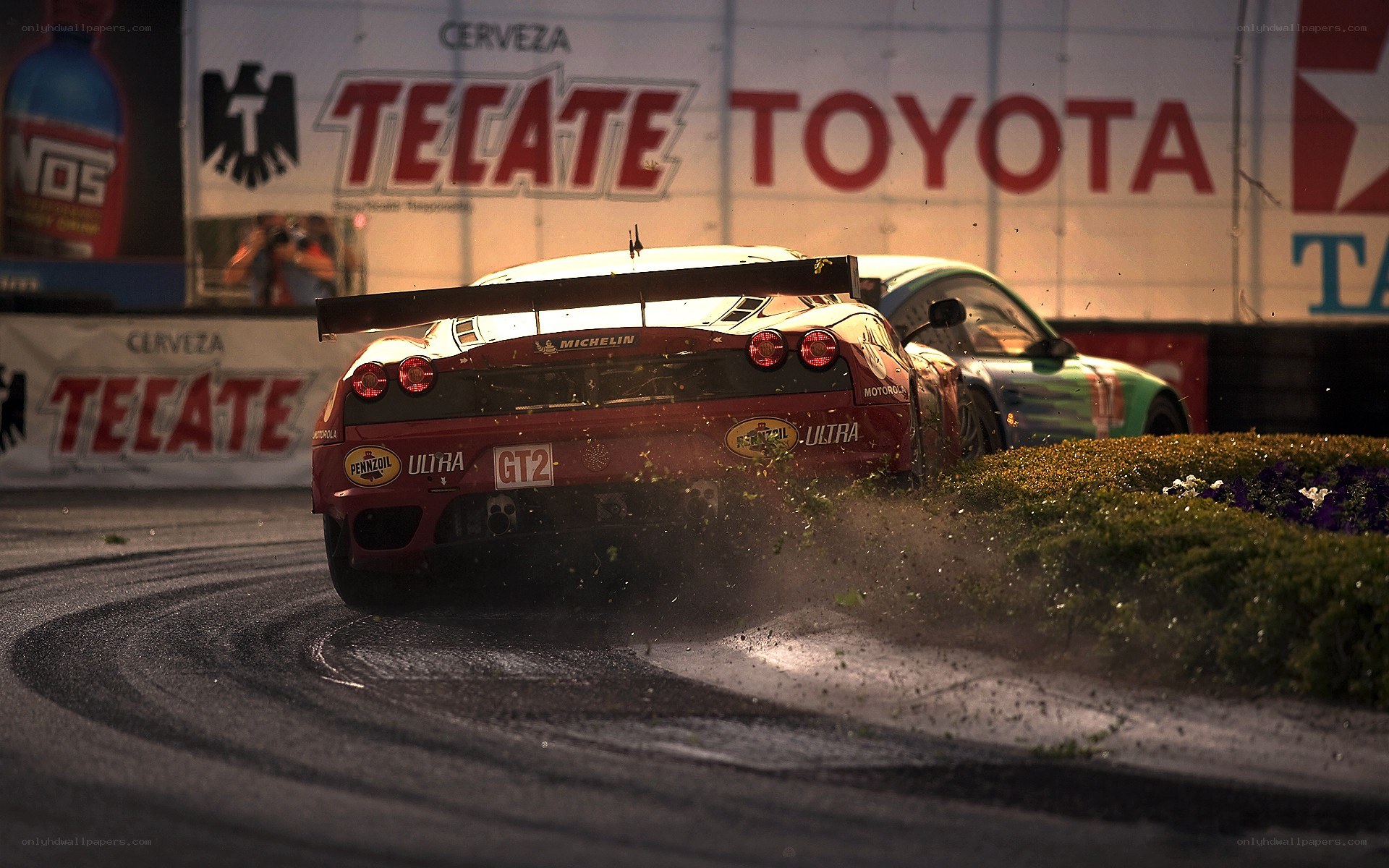Race car crashes into barrier
