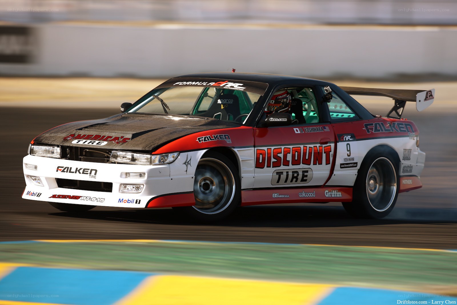 race car drifting on track