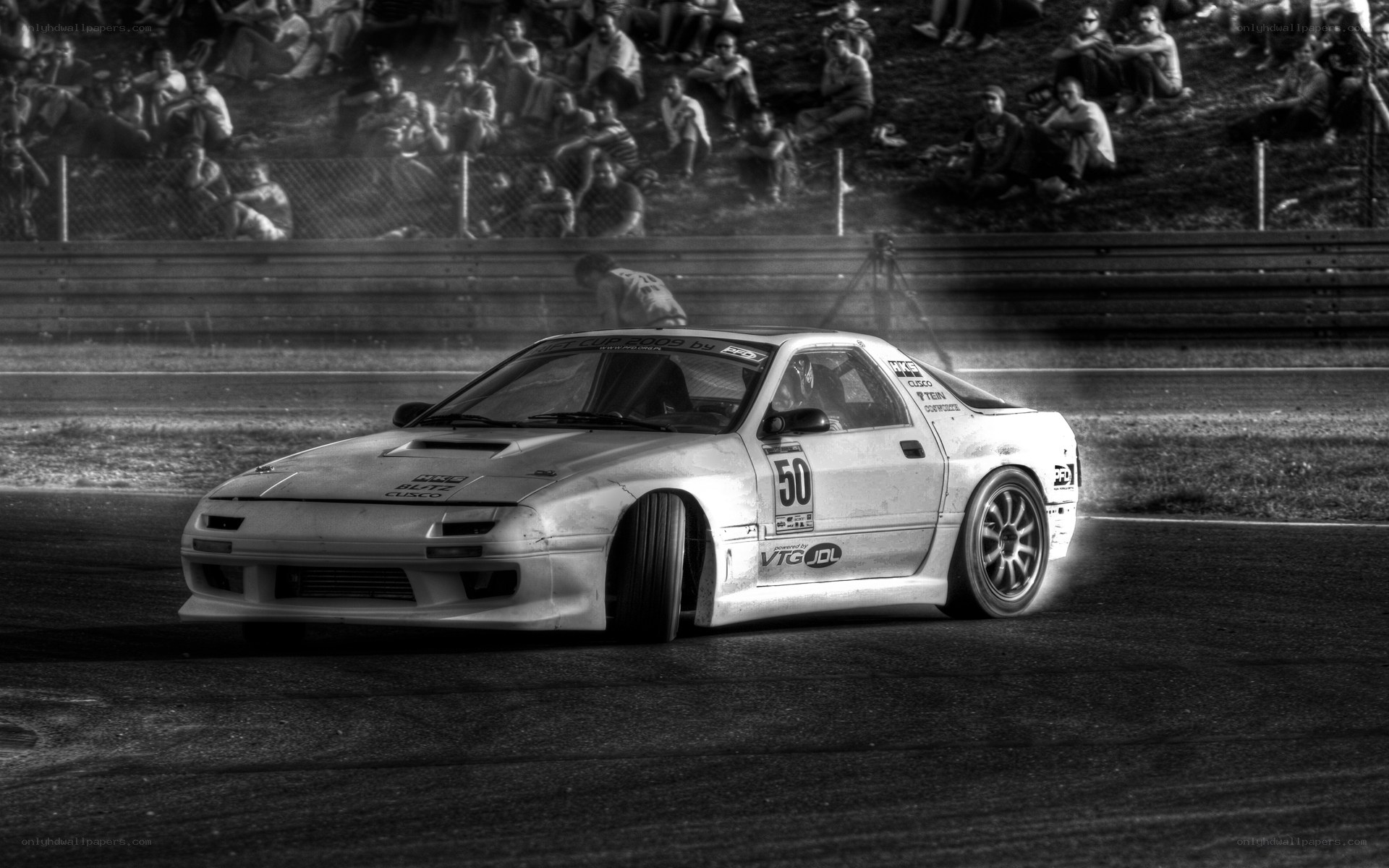 Race car drifting on track