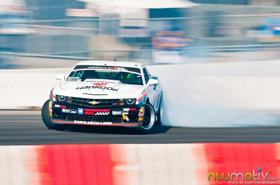 race car drifting on track