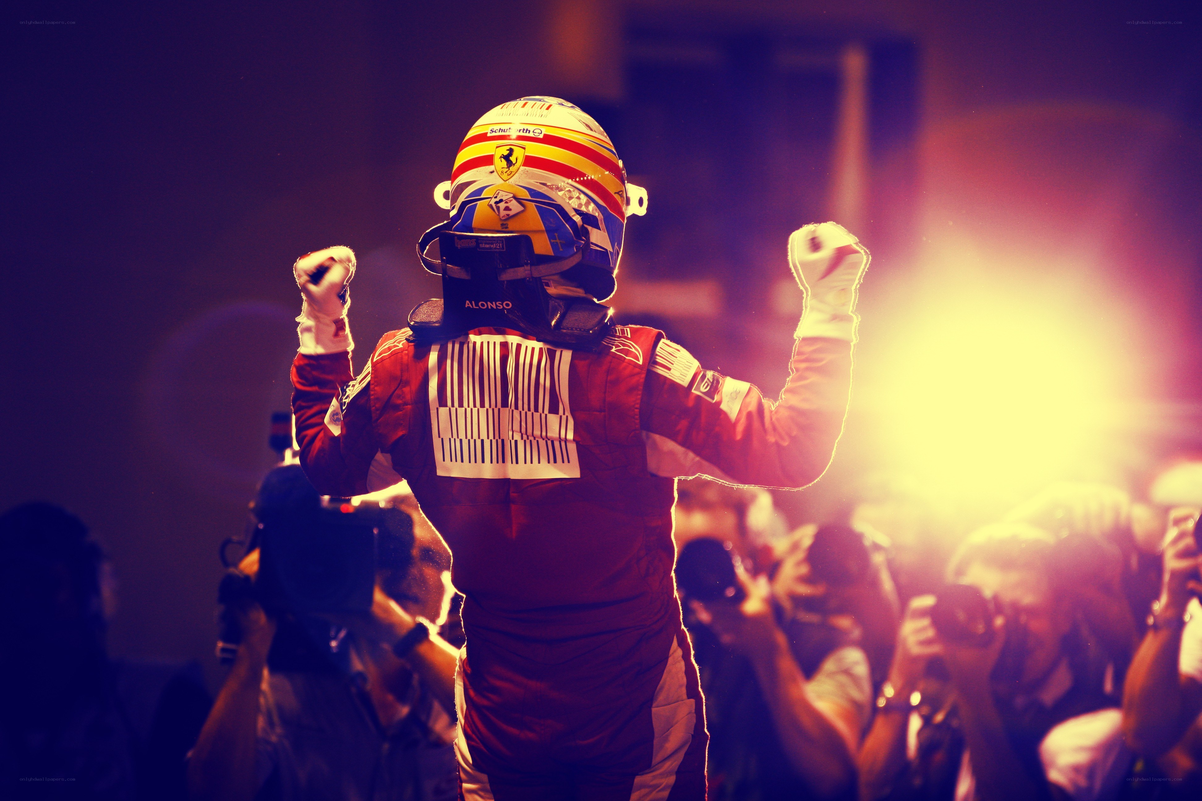 Race car driver celebrates victory