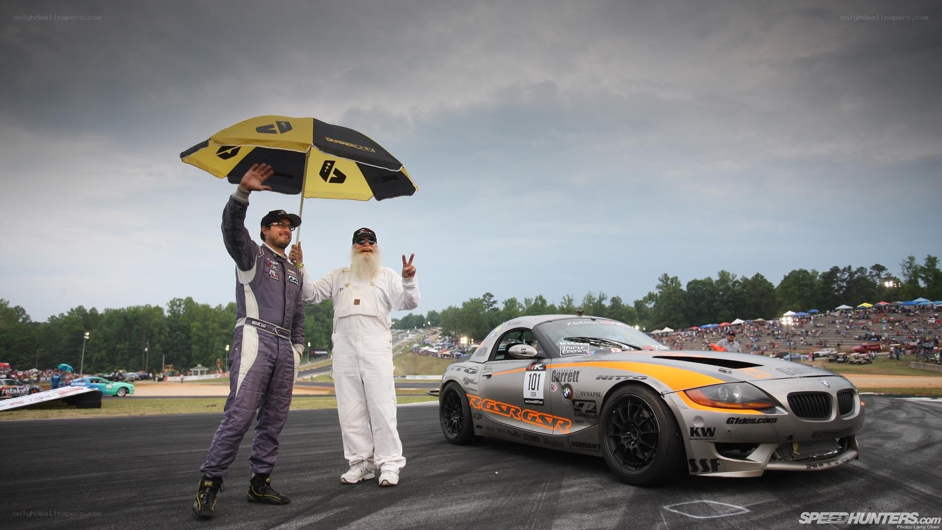 Race car drivers on track