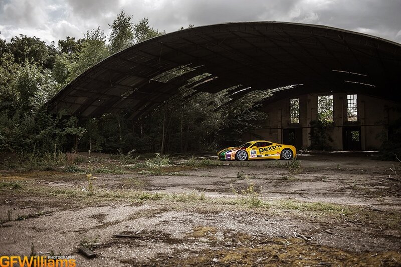 Race car in abandoned hangar