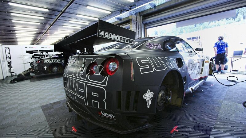 Race Car in Garage — Black, Focused
