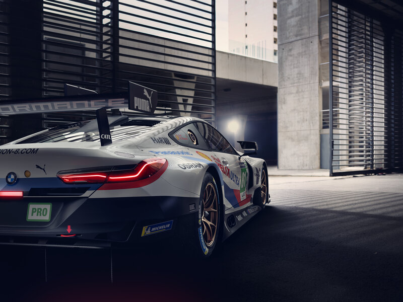 Race Car in Garage — White