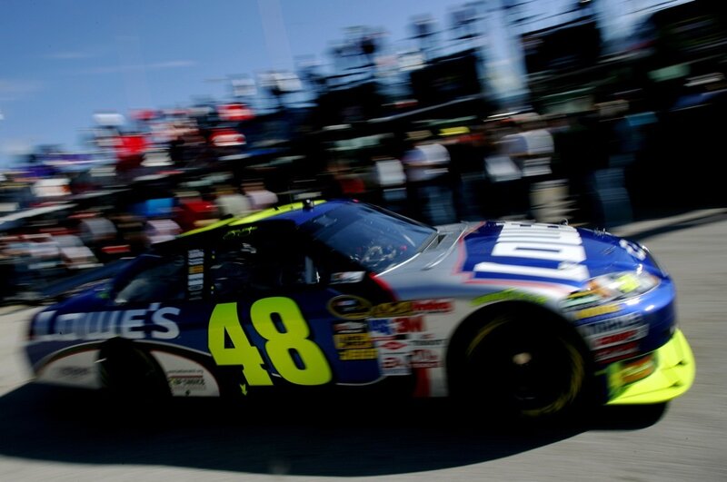Race car in motion at a track