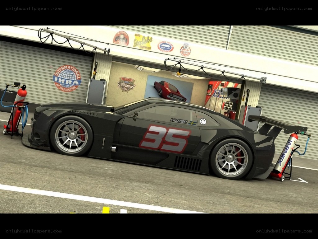 race car in pit garage