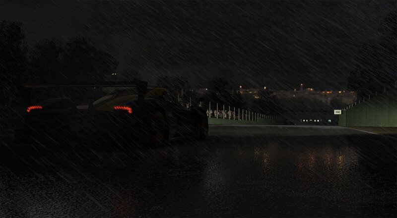Race car in rain at night