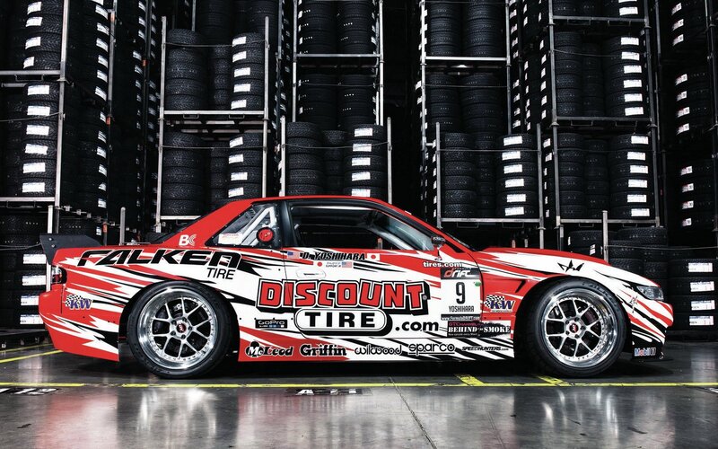 race car in tire warehouse