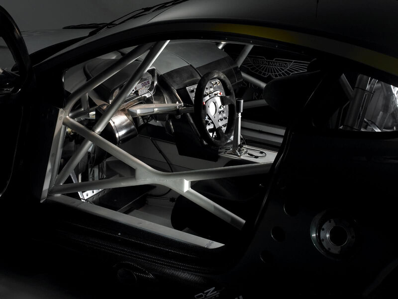 Race Car Interior — Black, Dramatic, Photograph, Roll Cage, Steering Wheel