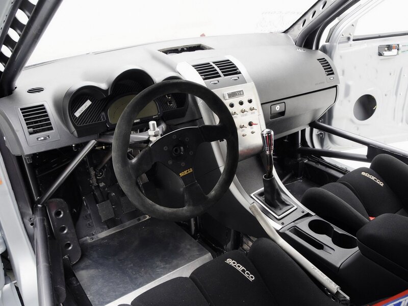 Race Car Interior — Black, Functional, Photograph, Steering Wheel