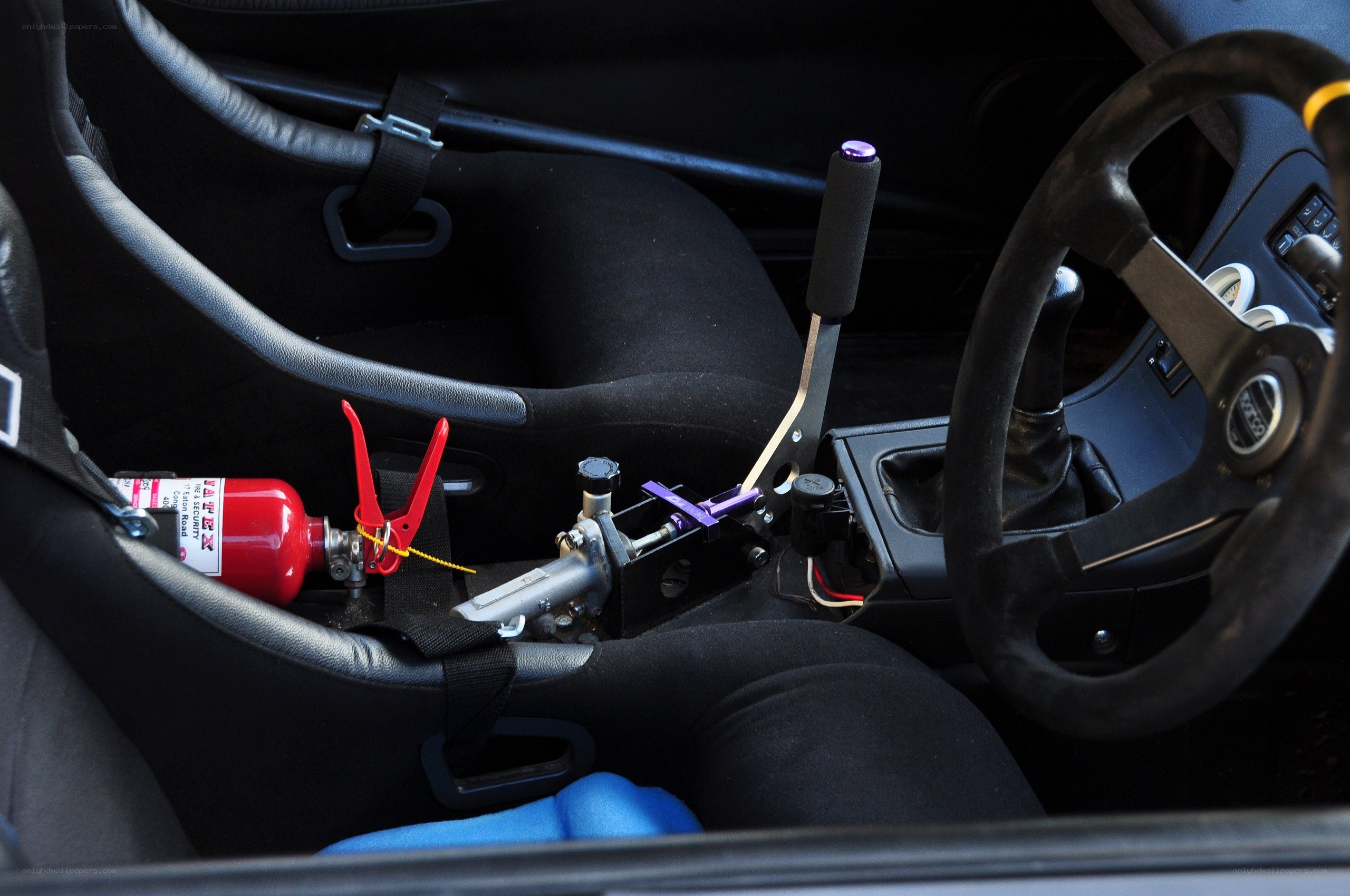 race car interior with fire extinguisher